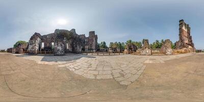 full spherical hdri 360 panorama near stone abandoned ruined tower of portugese church in old goa india in equirectangular projection, VR AR virtual reality content photo