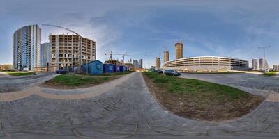 hdri 360 panorama near new with skyscrapers and residential complex under construction with high-rise tower cranes in full equirectangular seamless spherical projection photo