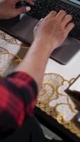 Businessman hands typing on laptop computer keyboard. Close up of hands typing on laptop keyboard by moving the camera. video