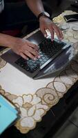 Businessman hands typing on laptop computer keyboard. Close up of hands typing on laptop keyboard with zoom camera movement. video