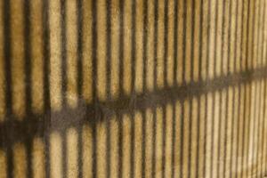Abstract light and shadow of architecture detail on concrete wall photo