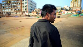 Man Walking Alone at the Beach video