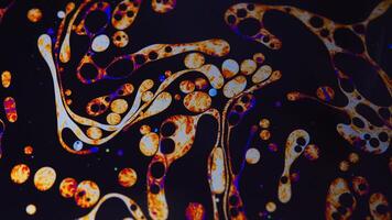 Colorful abstract art of liquid soap bubbles with psychedelic patterns, surreal moving patterns video