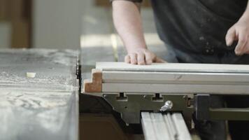 cutting wood on a circular saw in joinery video