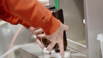 machine for automatic filling of beer bottles in a brewery video