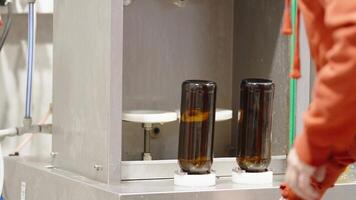 machine for washing and filling glass bottles with beer video