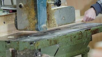 making furniture on a machine in a joinery video
