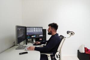 professional editor enhancing digital footage using specialized software photo