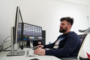 professional editor enhancing digital footage using specialized software photo
