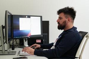 professional editor enhancing digital footage using specialized software photo