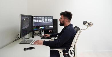 professional editor enhancing digital footage using specialized software photo