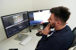 professional editor enhancing digital footage using specialized software photo