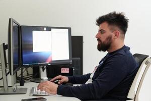 professional editor enhancing digital footage using specialized software photo