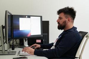 professional editor enhancing digital footage using specialized software photo