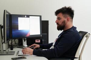 professional editor enhancing digital footage using specialized software photo