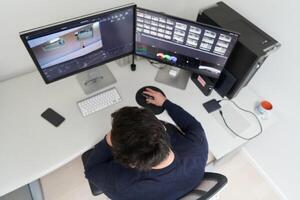 professional editor enhancing digital footage using specialized software photo