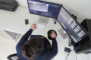 professional editor enhancing digital footage using specialized software photo