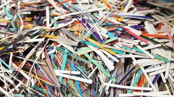 Pile of shredded paper. Document shredding, identity theft and fraud concept video