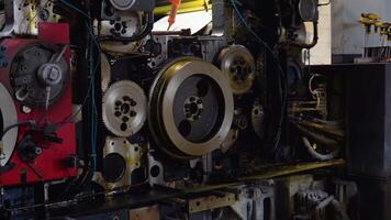 A fragment of the engine. Engine gears wheels, closeup view video