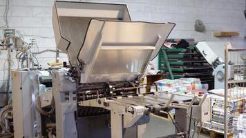 Offset printing machine at printing factory video