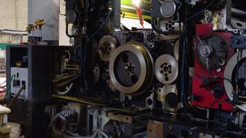 A fragment of the engine. Cogwheels machinery , engineering and industry or concepts such as teamwork and search engine video