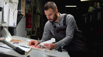 Designer selects proper color from swatch palette for promotion. Design and art concept video