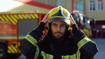 Fireman puts on a protective uniform video