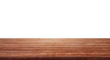 empty wooden table front view isolated on white background. photo