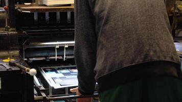Printing machine works, rolling printed newspaper in typography facility video