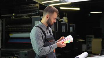 Designer selects proper color from swatch color palette video