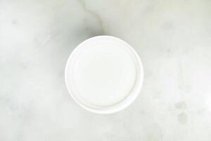 Cashew Nut Dew dip paste served in cup isolated on grey background top view of asian drink photo