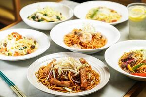 Spaghetti Noodles with Pork Chop in Swiss Sauce, Spaghetti with Shrimps and mushroom, Spaghetti with Shredded Beef with Black Pepper, Linguine pasta Crab Roe Smoked Salmon, Penne Spinach and Mushroom photo
