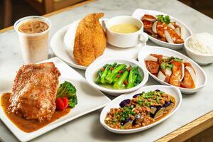 Minced Pork with Eggplant, Crispy Fish Fillet with boiled Rice in Sweet Corn Sauce, Crispy Chicken Steak, Pork Chop Zhenjiang Vinegar Sauce, Pork Chop in Peking Style, baby kailan,and cold coffee photo