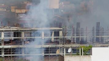 Large Fire With Smoke In A Building Under Construction In The City video