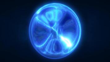 A glowing blue orb with fluid, swirling patterns inside, set against a dark video