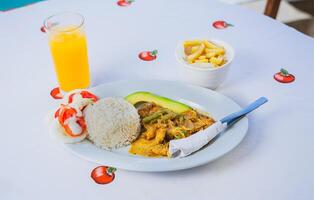 Top view of a traditional breakfast served on the table. Traditional breakfast with orange juice served on the table photo