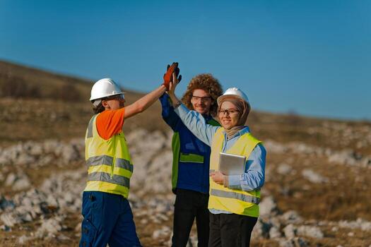Engineers Collaborating in the Field to Inspect and Optimize Electric Turbines. photo