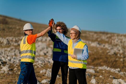 Engineers Collaborating in the Field to Inspect and Optimize Electric Turbines. photo