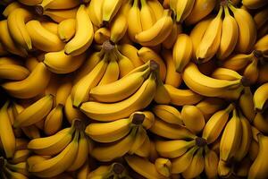 A pile of fresh bananas form the background, shown from above photo