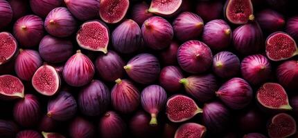 A pile of fresh Fig form the background, shown from above photo