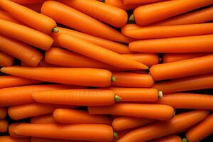 A pile of fresh carrot form the background, shown from above photo