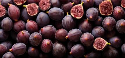 A pile of fresh Fig form the background, shown from above photo