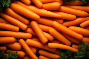 A pile of fresh carrot form the background, shown from above photo