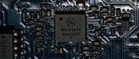 a close up of a circuit board with a chip photo