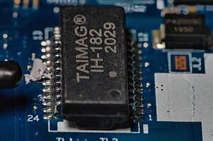 a close up of a computer motherboard photo