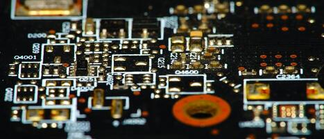 close up of a circuit board with many different components photo