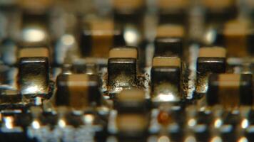 close up of a circuit board with many different types of electronic components photo