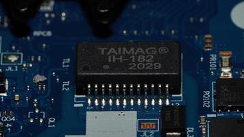 a close up of a motherboard with a small electronic device photo