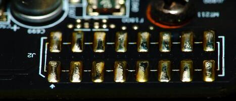 a close up of a circuit board with a bunch of different colored wires photo