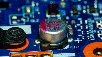 a close up of a circuit board with a small electronic device photo